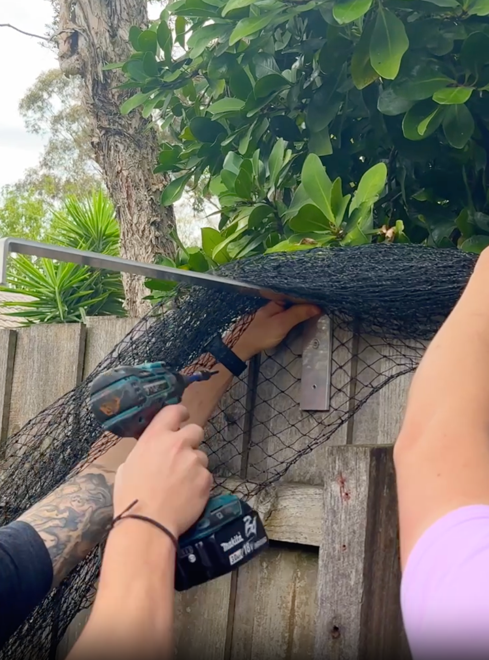 Use power tools to install and attach the cat net to the fence or wall